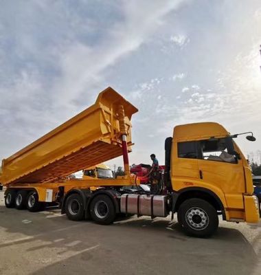 80 ton capaciteit Hydraulische kant-kippende aanhangwagen Truck Robuuste 4-assige achterste dump half-aanhangwagen