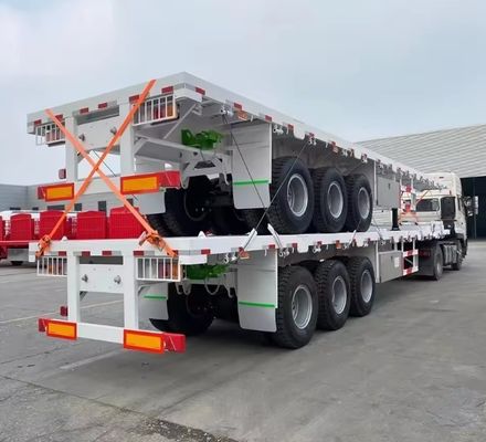 90T Max Payload Steel 20FT 40FT Container Flatbed Semi-Trailer met 12r22.5 band