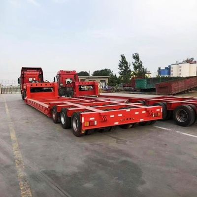 Transport Zwaar materieel met 100 ton hydraulische oprit laagbed vrachtwagen halve aanhanger